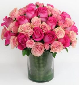 Roses in shades of pink. Designed in a glass cylindar, Compact modern design style